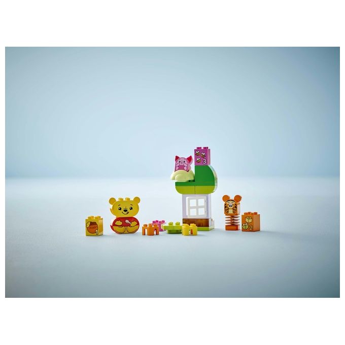 LEGO DUPLO - Disney Festa di Compleanno di Winnie the Pooh - Giocattolo Educativo con Personaggi con Doppio Volto e Casa sull'Albero Giochi Didattici per Bambini e Bambine da 18 Mesi in su - 10457