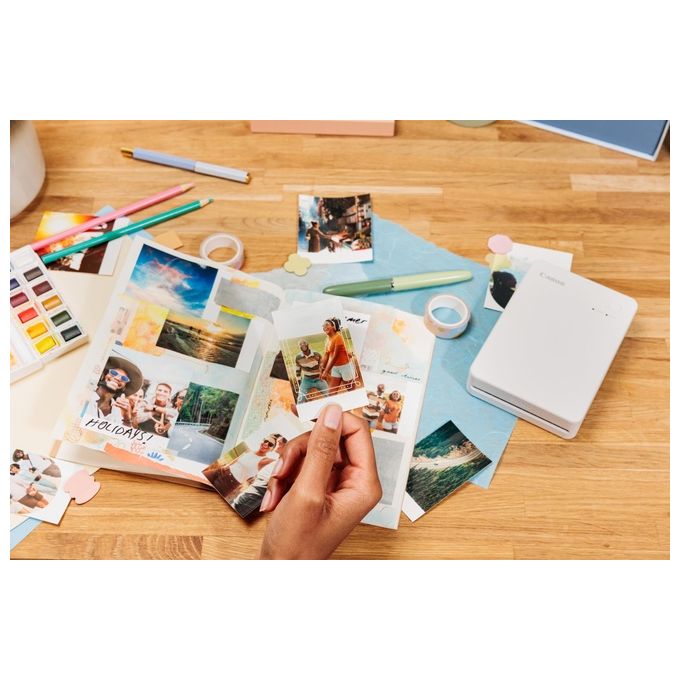 Canon Stampante portatile SELPHY QX20: per la stampa Wi-Fi direttamente dal tuo dispositivo smart. Stampa a sublimazione 2 formati di stampe con adesivo rimovibile e ricarica USB-C - Nero