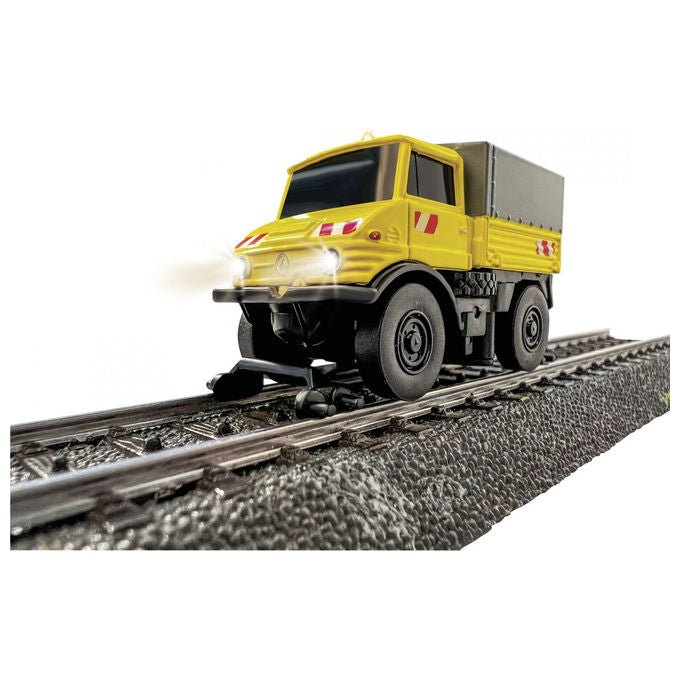 Carson 500504146 Unimog U406 Modellino Radiocomandato Scala 1:87 Motore Elettrico Frequenza 2.4 GHz con Luci LED Batteria Li-Ion 75 mAh colore Multicolore