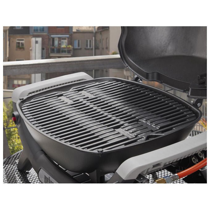 Weber Q1100N, Barbecue da Tavolo GPL, Nero e Grigio, 2930W, Portatile, con Griglia in Ghisa
